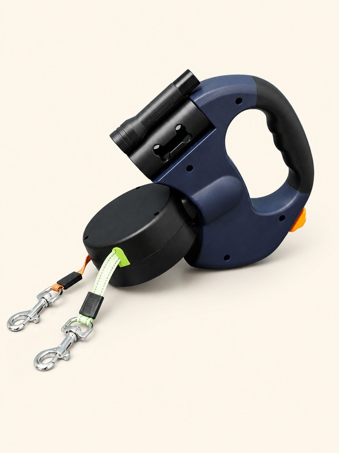 Navy blue dual retractable dog leash with green and orange reflective leads