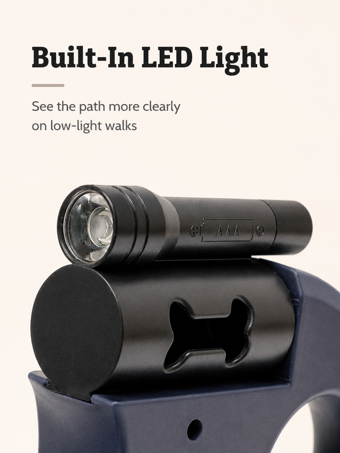 Built-in LED light close-up on dual retractable dog leash