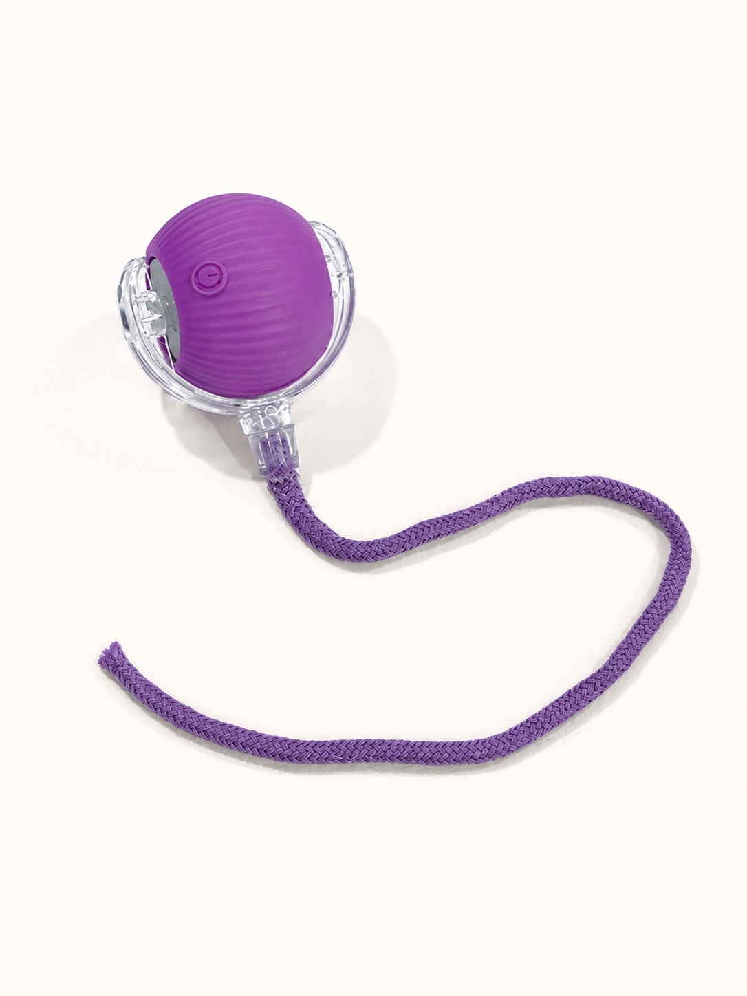 Purple interactive rolling ball with rope tail