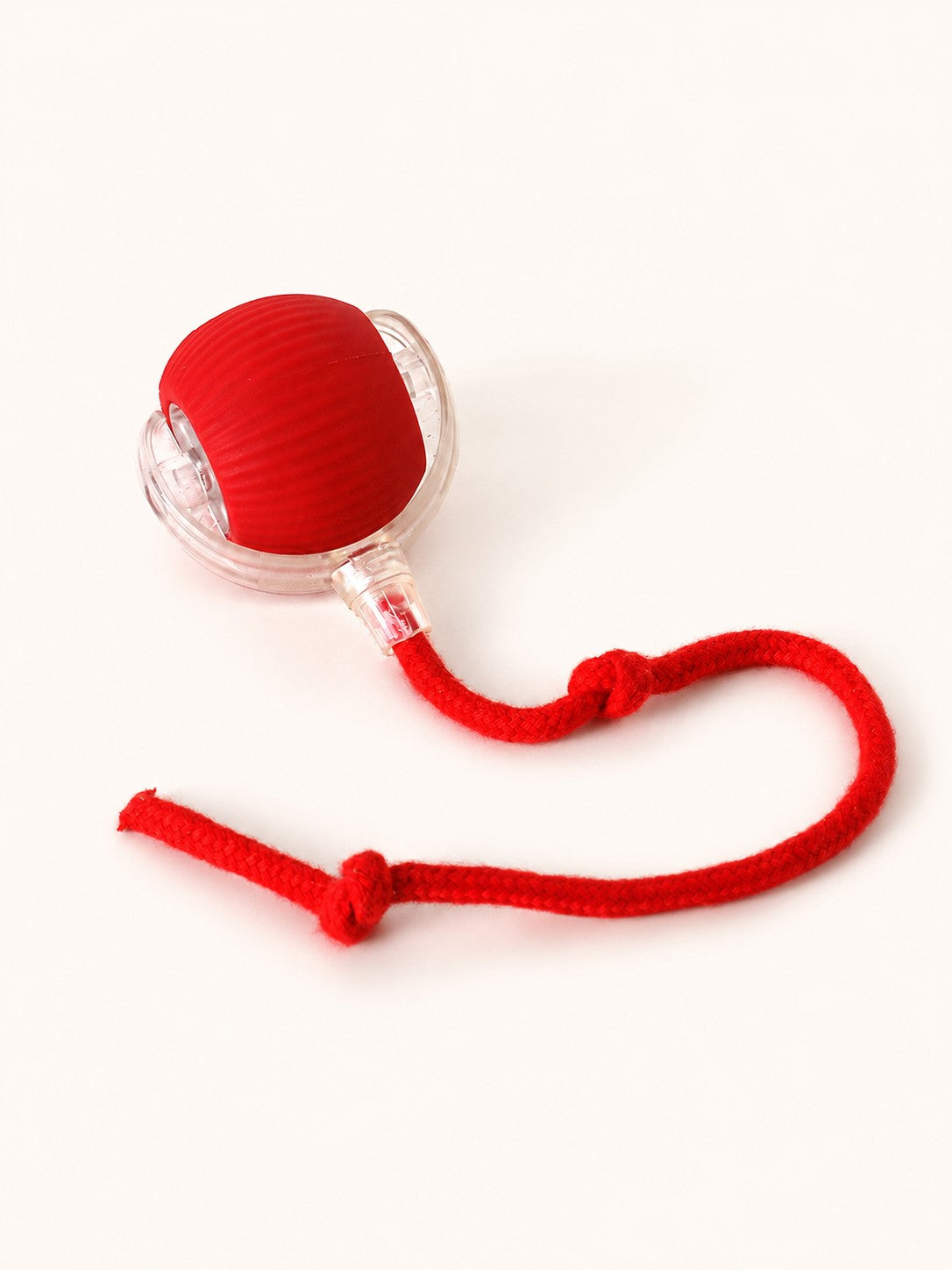 Red interactive rolling ball with rope tail