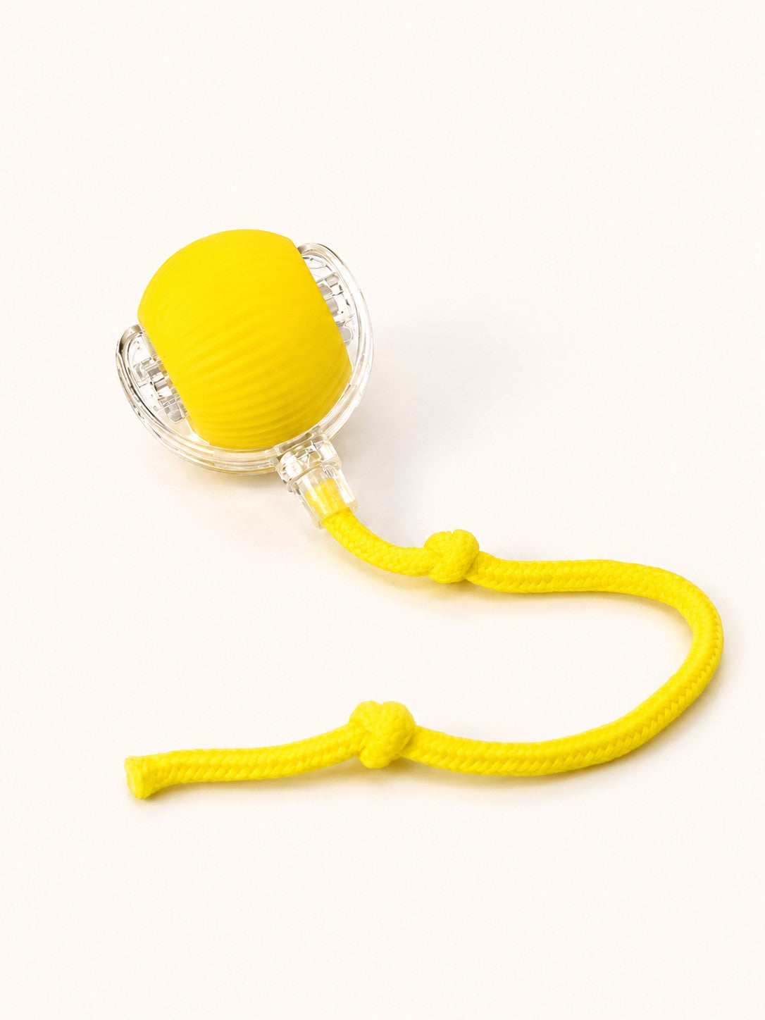 Yellow interactive rolling ball with rope tail